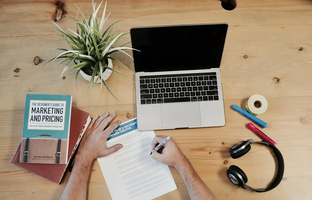 marketing, business, flatlay, desk, computer, pricing, writing, working, planning, brainstorming, research, marketingautomation, campaign, brown computer, brown marketing, brown writing, brown desk, brown research, brown plan, brown planning. Nonprofit fundraising campaigns: the parts worth your attention